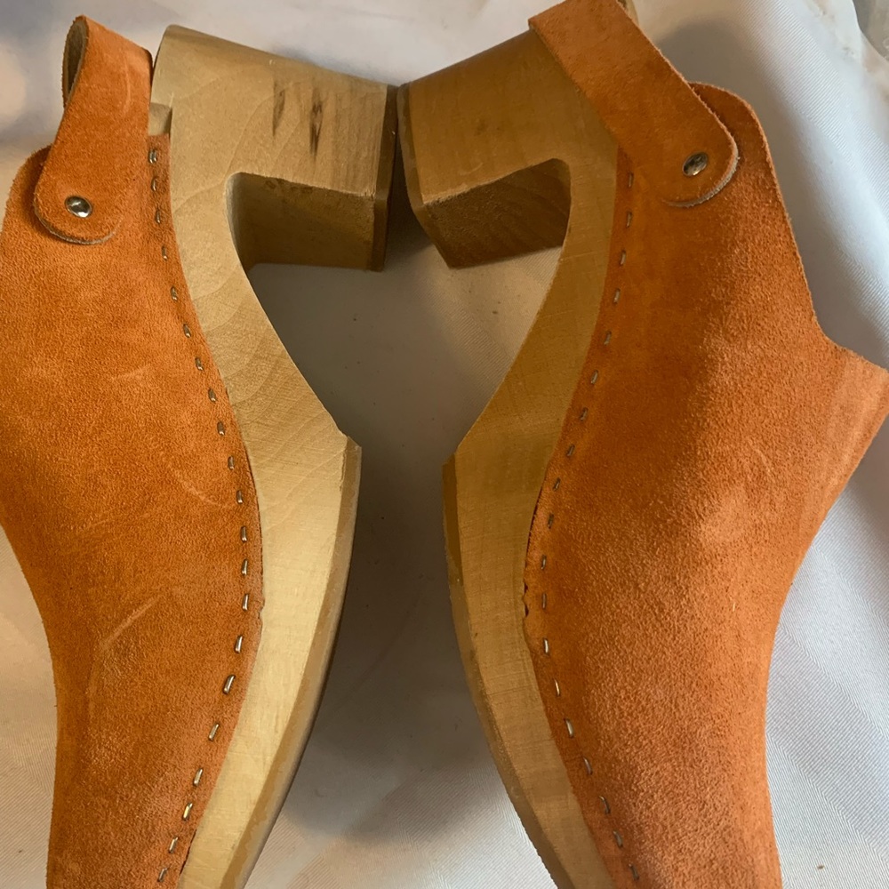 Orange leather clogs